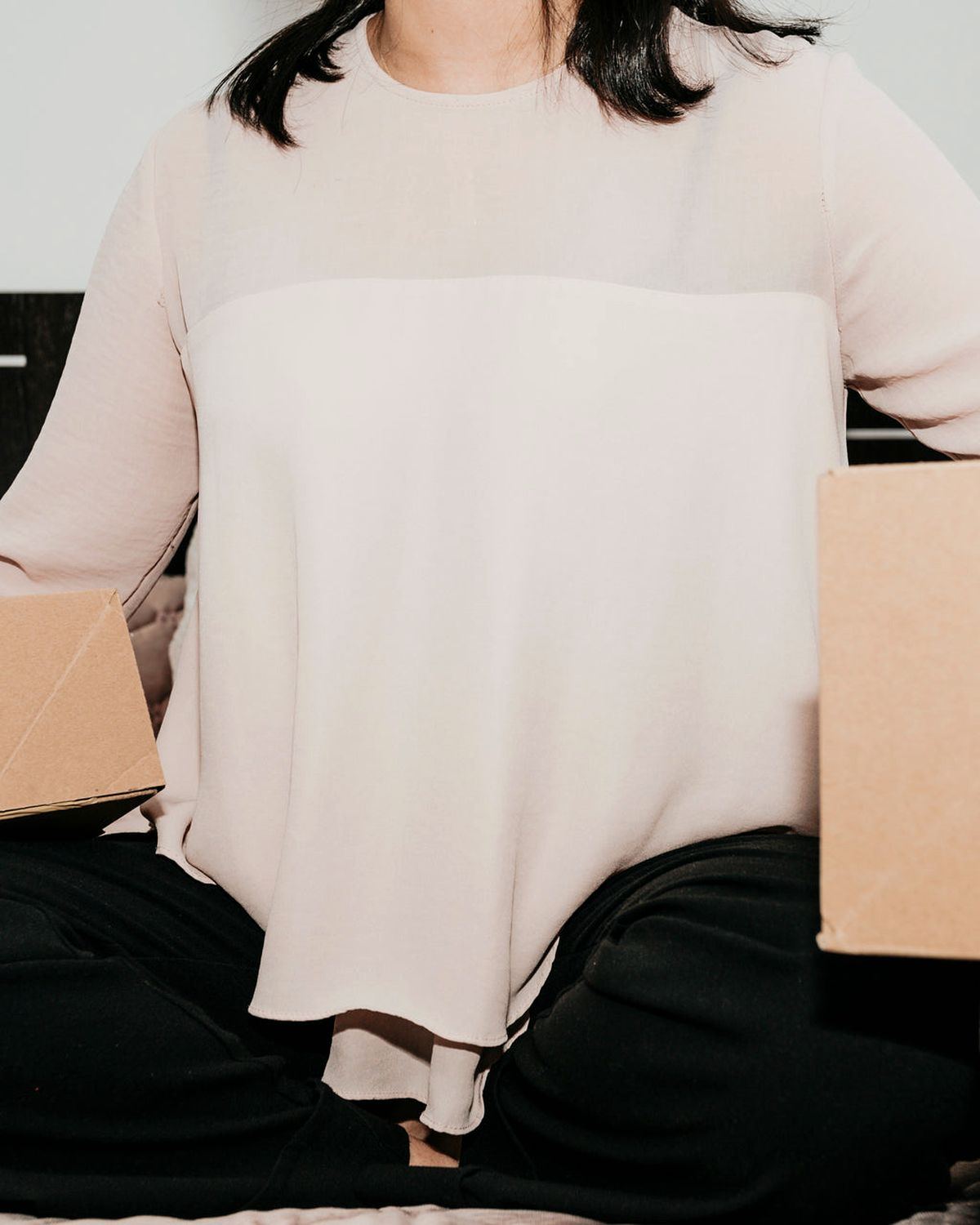 A student unpacking in a new apartment